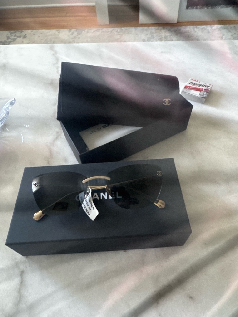 CHANEL Black Rimless Cat-Eye Sunglasses with Gold Accents - Picture 8 of 12